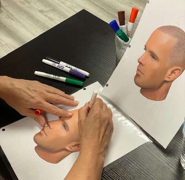 Portrait sketch of a bald headed person